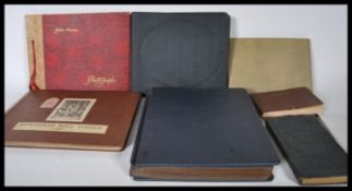A selection of four early 20th Century photograph albums to include an of photographs by George