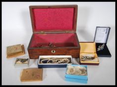 A collection of vintage 20th Century and later costume jewellery to include silver charms of a horse