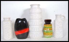 A collection of mid 20th Century West German studio pottery vases to include, a fat lava Bay Extra