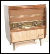 A mid 20th Century record player / stereo gram by Telefunken Fonata 2183, having hinged top