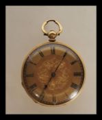 A Swiss Baume Geneve 18ct gold pocket watch having a gilt face with Roman numerals to the chapter