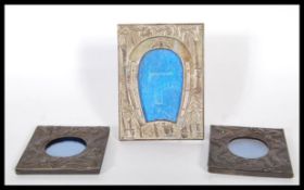 A group of three 20th Century Chinese photo frames to include two cast metal fronted Chinese