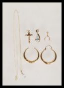 A selection of 9ct gold jewellery to include a pendant necklace having a white stone pendant on a