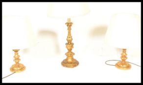 A gilt wood gesso table lamps with a matching pair