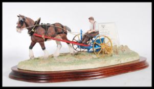 A Border Fine Arts limited edition 626/950 figure, model 'Rowing Up' by Ray Ayres. Raised on a