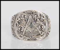 A gentleman's Masonic  silver 925 signet ring having engraved Masonic symbols to the head and