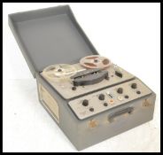 A vintage 20th Century Brenell MK5 reel to reel tape recorder, housed in it's own carry case with