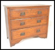 An early 20th Century Art Deco vintage dressing chest of drawers. The bank of three straight drawers