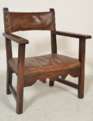 An early 20th Century Art Deco open framed childs fireside armchair, the oak frame upholstered in