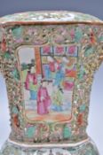 A CANTON FAMILLE ROSE RELIEF MOULDED & FLARED OCTA