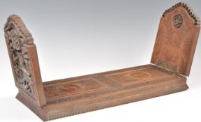 A 19TH CENTURY CHINESE HARDWOOD EXTENDING BOOKSTAN