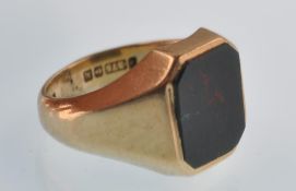 A modern 9ct gold and bloodstone cut-corner rectan