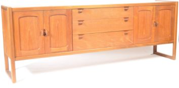 A 20TH CENTURY RETRO VINTAGE TEAK WOOD SIDEBOARD.
