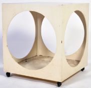 RETRO 1970'S WHITE PAINTED PLYWOOD AND BLACK GLASS COCKTAIL TABLE