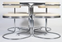 VINTAGE TUBULAR CHROMED DINING SUITE IN THE MANNER OF A. LORENZ