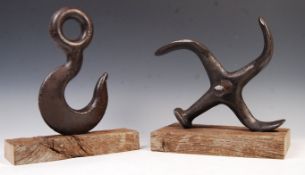 PAIR OF CAST METAL NAUTICAL THEMED DOOR STOPS.