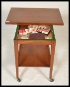 A vintage retro mid 20th Century teak wood tea tro