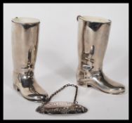 A pair of 20th Century silver plated drinks measur