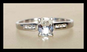 A hallmarked 9ct white gold ladies ring prong set