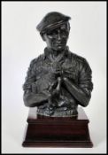 J Anne Butler ( British 20th century ) A cold cast bronze finish sculpture entitled ' Ike ' being