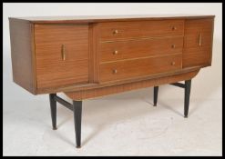 A vintage retro 1950's teak wood veneer sideboard