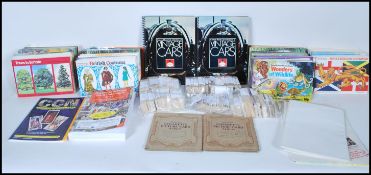 A collection of vintage cigarette cards dating to the first half of the 20th Century, all the