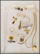 A quantity of vintage and later costume jewellery to include a silver ingot on chain, marcasite