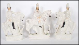 A pair of Victorian 19th century Staffordshire flatback figurines to include G. Stewart & G.