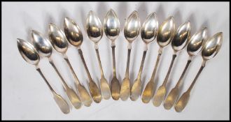 A collection of German silver teaspoons in the fiddle pattern by Schott. Marked Schott FD 13. Weight