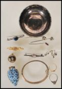 A collection of jewellery dating from the 19th Century onwards to include a stamped 9ct gold
