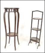 An early 20th Century mahogany 3 tier metamorphic cake stand having shaped tiers complete with the