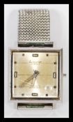 A vintage mid century gents Accurist square faced wristwatch. The champagne dial marked Accurist