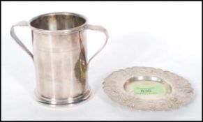 An early 20th century Persian / Islamic silver ( believed 800 ) dish cast in relief with geometric