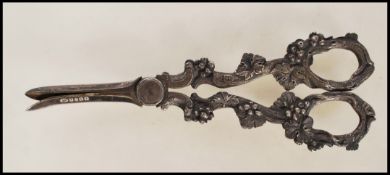 A pair of late 19th / early 20th Century William Hutton & Sons silver plated grape scissors the