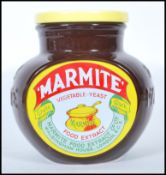 A large  20th century  'Marmite ' cookie jar with lid believed to be by Wade. Complete with rubber