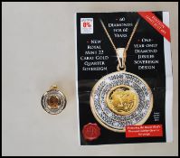 A 2012 new royal mint 22 carat gold Diamond Jubilee quarter sovereign pendant, having St George
