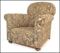 A late 19th century Victorian Chesterfield armchair having barrel  and back rest  being raised on