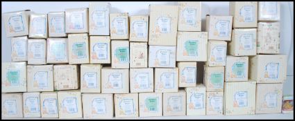 A large collection of boxed collectors Cherished Teddies figurines of various different designs,