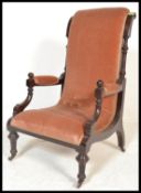 A 19th century Victorian mahogany Library / Salon chair upholstered in a ochre pinkish hue velour