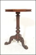 A 19th Century Victorian mahogany wine occasional table raised on carved tripod base. The
