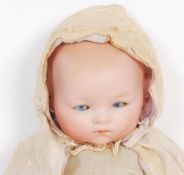 VINTAGE TEDDY BEAR AND PORCELAIN HEADED DOLL