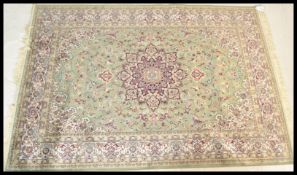 A large Persian floor carpet Keshan rug having a g