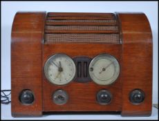 A vintage mid 20th Century walnut cased Goblin  