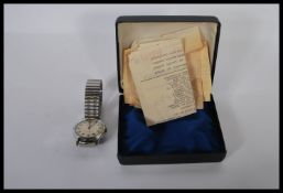 A mid century, circa 1960's vintage gentlemans wristwatch by Accurist having a champagne dial with