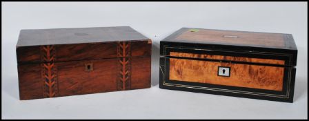 A 19th century Regency amboyna wood writing slope box of rectangular form with ebony crossbanding