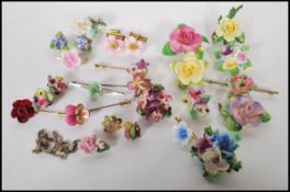 A collection of vintage 20th Century bone china flower jewellery and accessories to include a