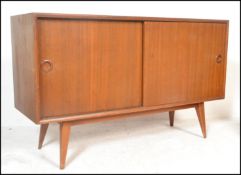 A vintage mid 20th Century Vanson walnut sideboard / credenza having twin doors to the front opening