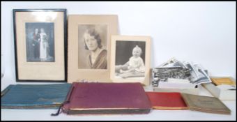 Old black and white photos.Quantity in box inc albums one of which contains 1942 WWII images of