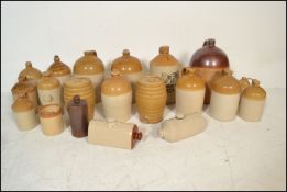An extensive local collection of 19th century and early 20th century stoneware / saltglaze flagons