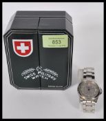 A cased Swiss Military wristwatch by Charmex of Switzerland. The watch set to a stainless steel